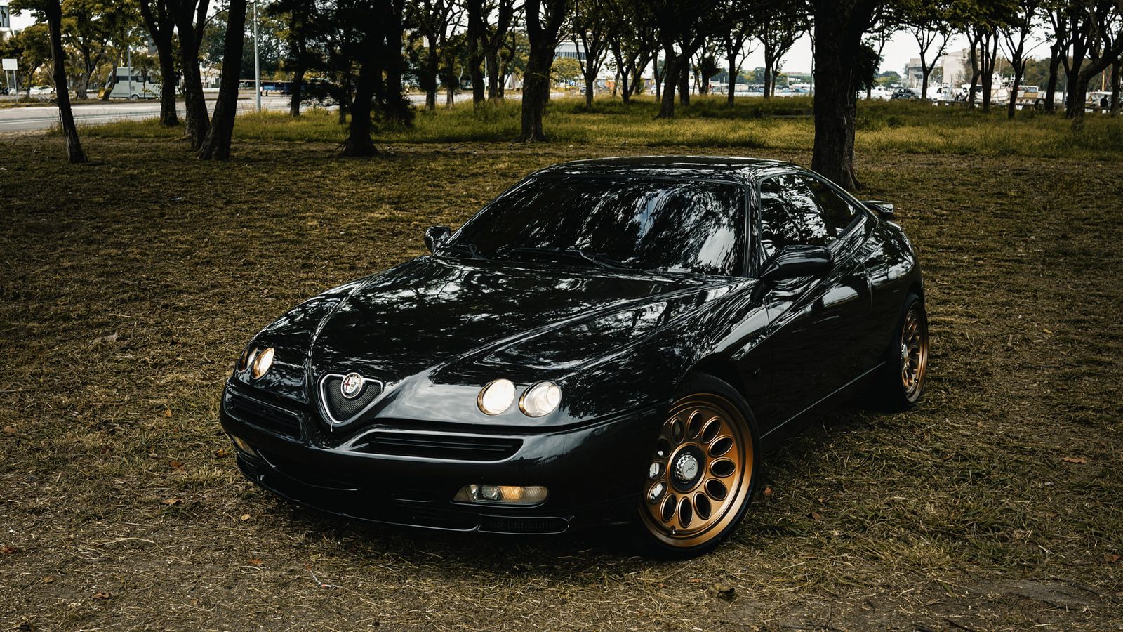 Alfa Romeo 916 GTV Black on Jaeges RA wheels