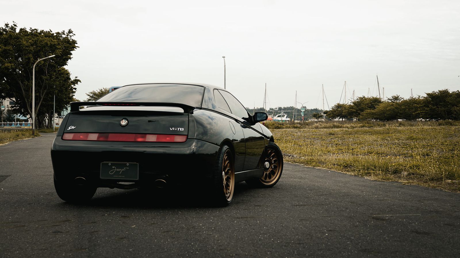 Alfa Romeo 916 GTV Black on Jaeges RA wheels