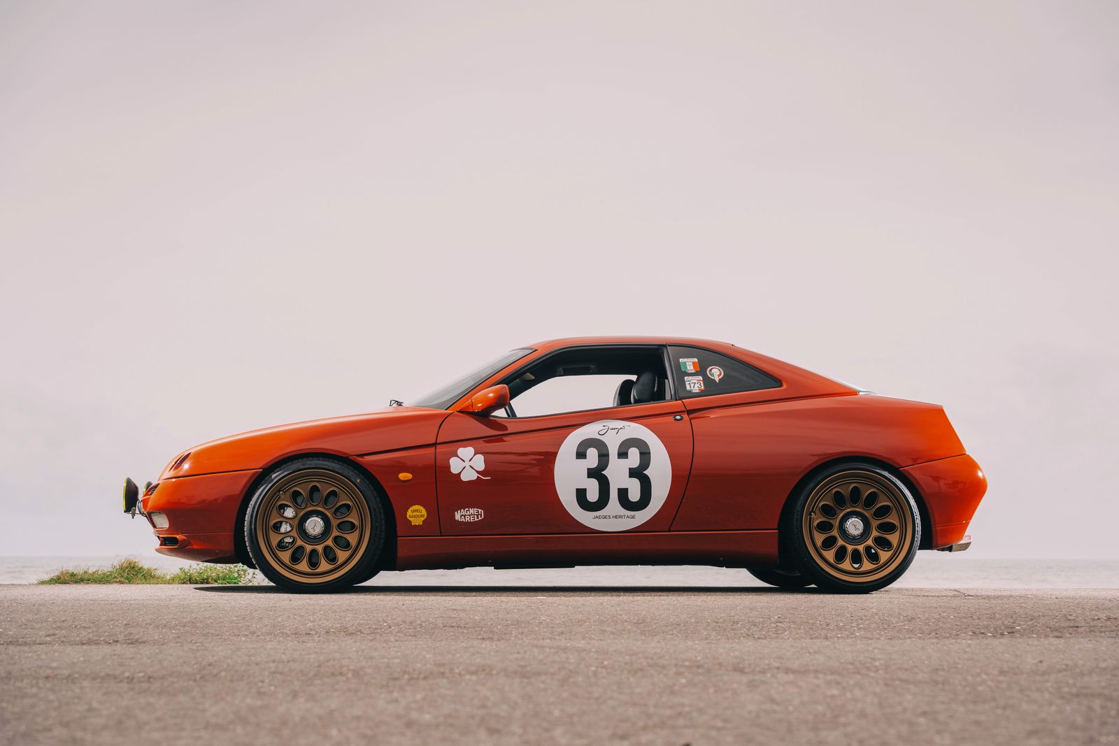 Alfa Romeo 916 GTV Red on Jaeges RA wheels